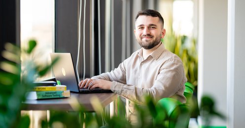 Developer working by the window